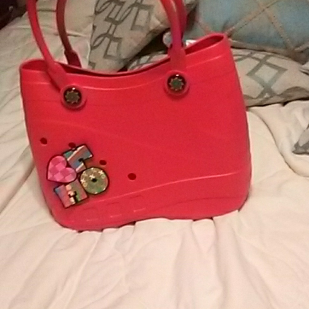 Large red rubber bag   NWOT